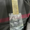 Tag sườn áo Burberry dài tay mầu đen kẻ đỏ túi chéo