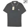 Áo Polo Burberry cổ điển logo thêu nổi mầu đen vải sợi gai