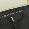 Mảnh da dập chữ Givenchy Paris đính túi sau quần tây nam